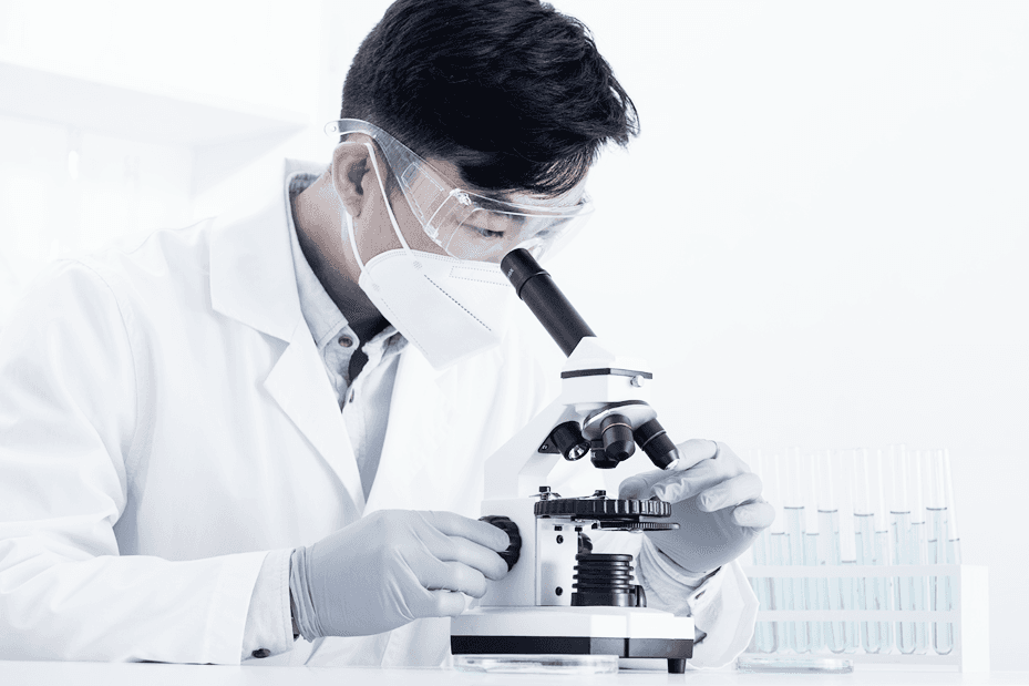 Scientist with Microscope